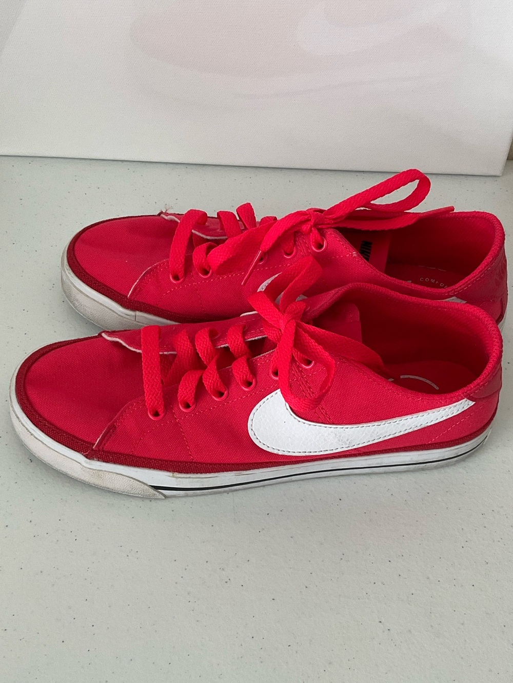 Nike Women's Hot Pink Canvas Low-Top Sneakers with White Swoosh - Picture 2 of 5